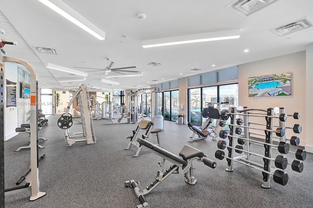 gym featuring plenty of natural light and ceiling fan