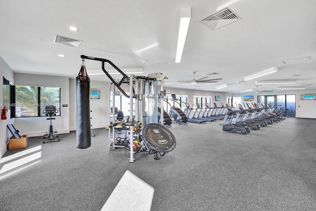 workout area featuring ceiling fan