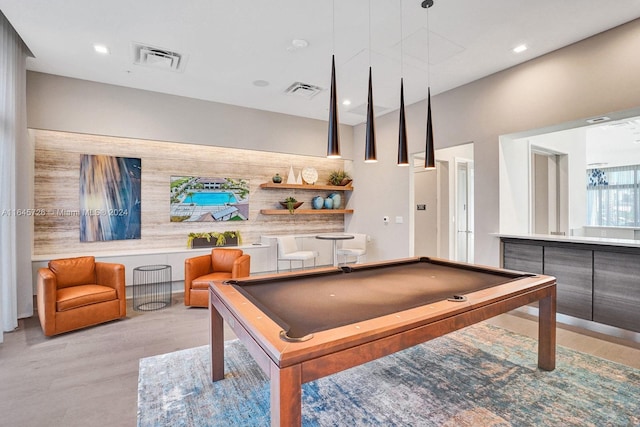 playroom featuring light hardwood / wood-style flooring and pool table