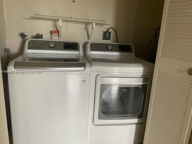 laundry room featuring washer and dryer