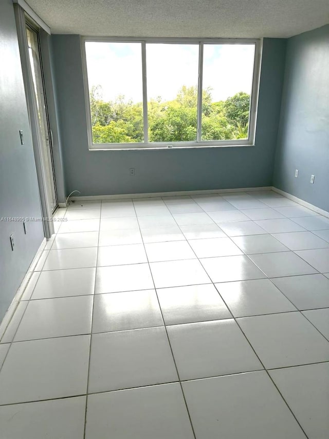 empty room featuring tile patterned flooring