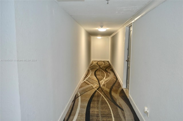 corridor with carpet floors