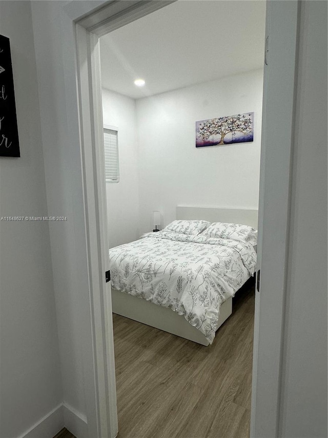 bedroom featuring hardwood / wood-style floors