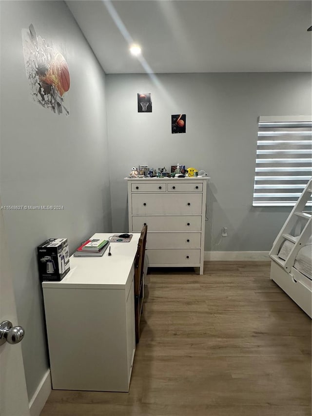 home office with light wood-type flooring