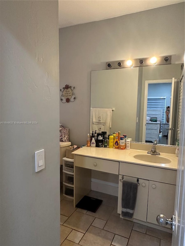 bathroom featuring vanity and tile patterned flooring