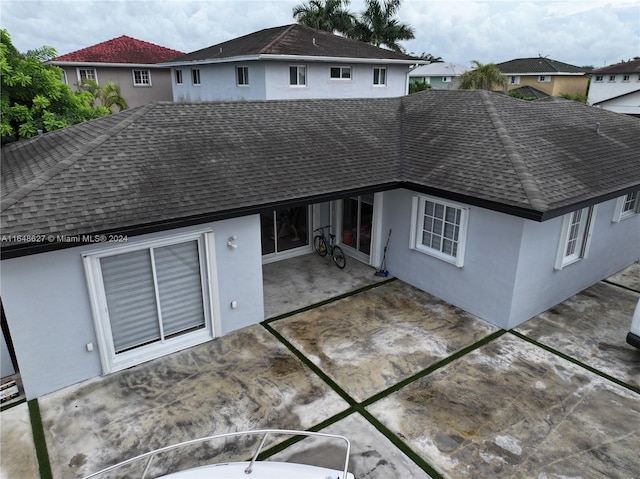 back of house featuring a patio