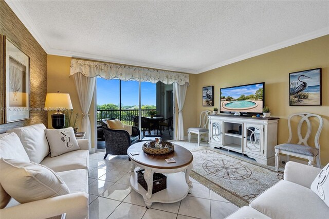 living room featuring light tile patterned floors, a textured ceiling, and ornamental molding