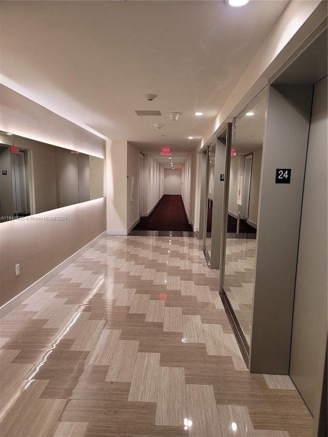 hallway featuring elevator