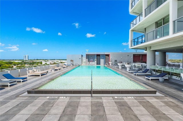 view of swimming pool with a patio area