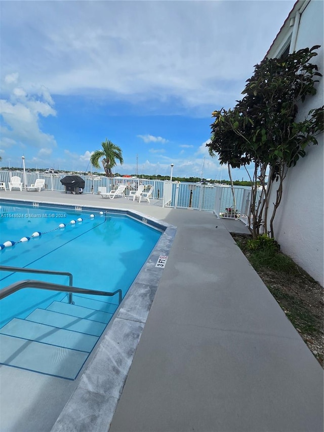 community pool with fence