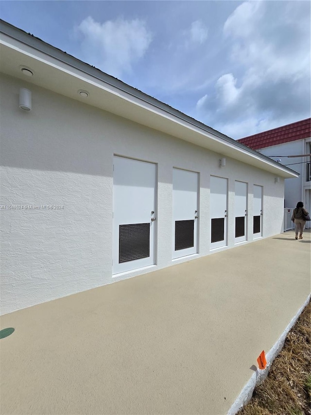 view of property exterior with a patio and stucco siding