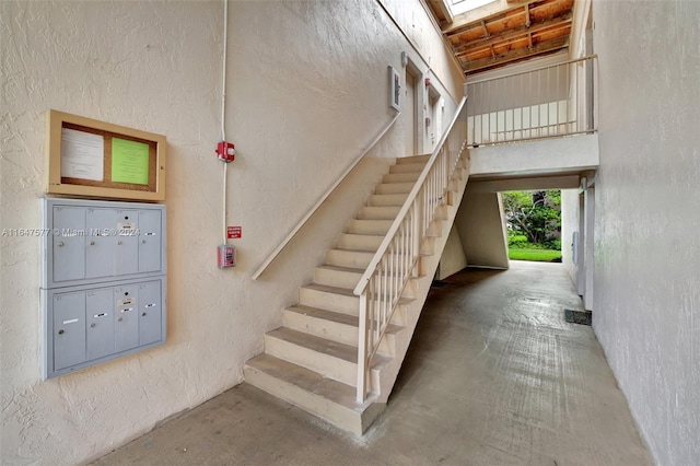 stairway with concrete floors