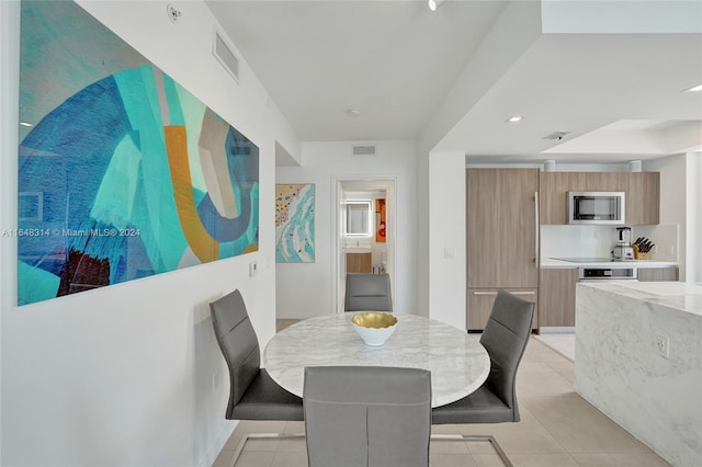 view of tiled dining area