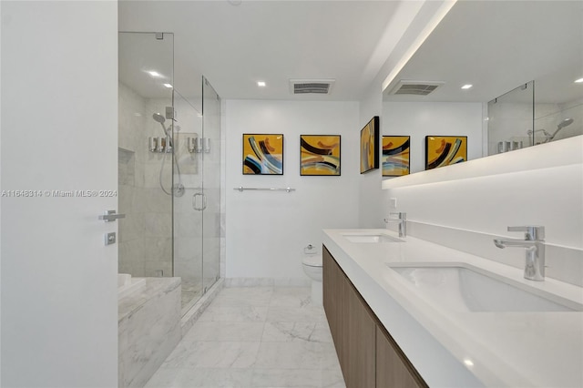 bathroom featuring vanity, toilet, walk in shower, and tile patterned floors