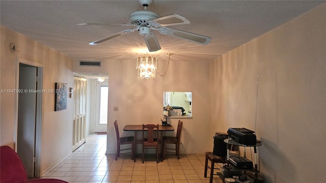 dining area featuring ceiling fan and light tile patterned floors