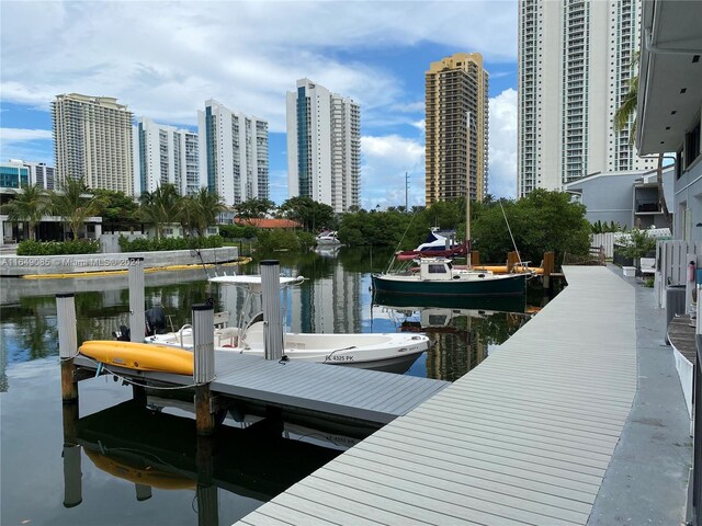 dock area featuring a water view