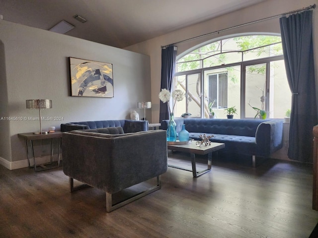 living room featuring dark hardwood / wood-style flooring