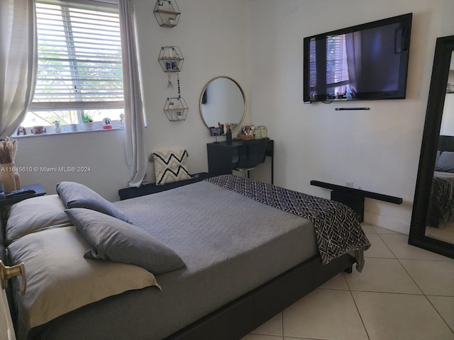 bedroom with tile patterned flooring