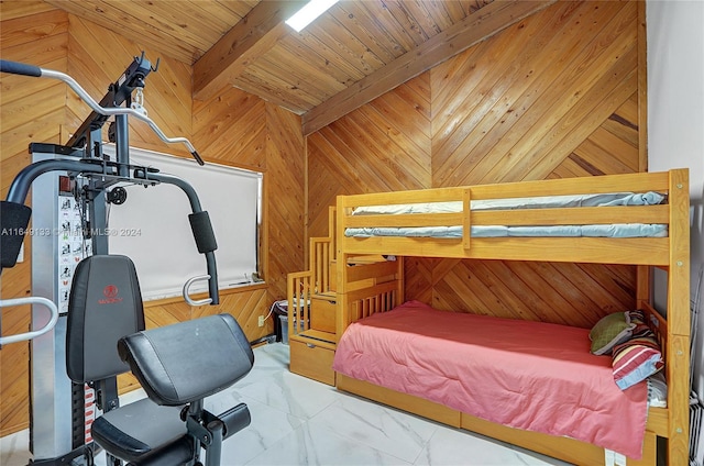 bedroom featuring wood walls, wood ceiling, marble finish floor, and beam ceiling