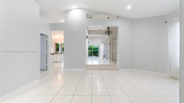 empty room with recessed lighting, light tile patterned flooring, and baseboards