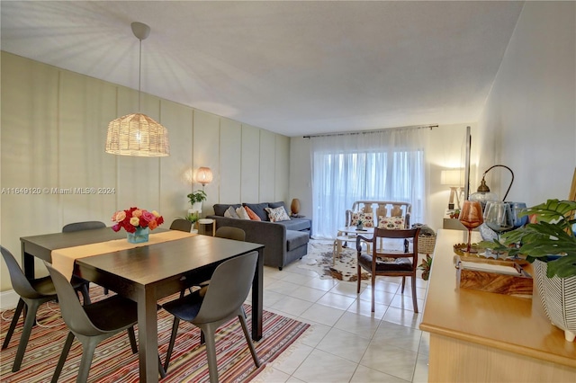 dining area with light tile patterned floors