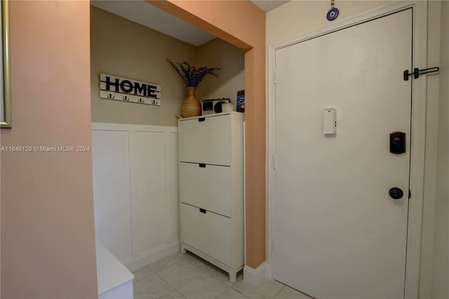 interior space with light tile patterned floors