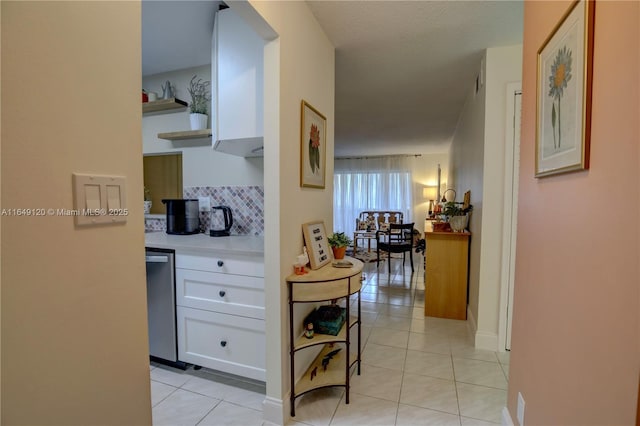 233 NE 14th Ave Unit 304, Hallandale Beach, FL 33009 - corridor featuring light tile patterned floors