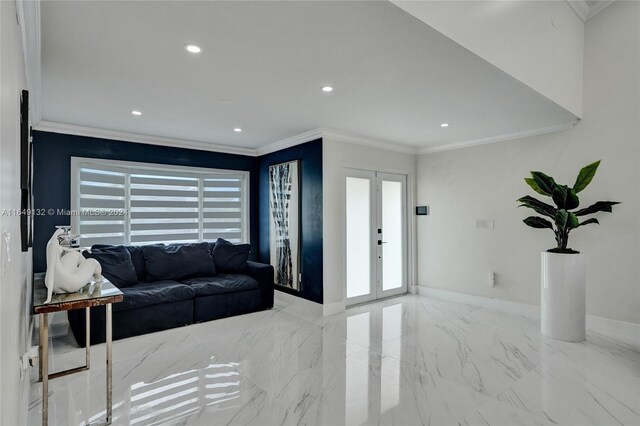 tiled living room featuring crown molding and french doors