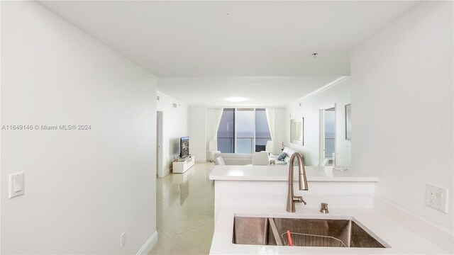 bathroom with vanity and tile patterned flooring