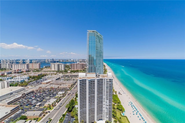 drone / aerial view with a view of the beach and a water view