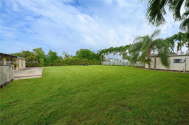 view of yard with a patio area