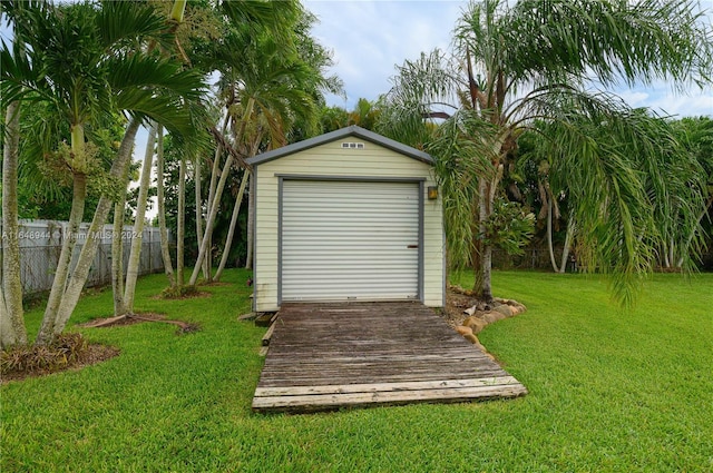 garage with a lawn