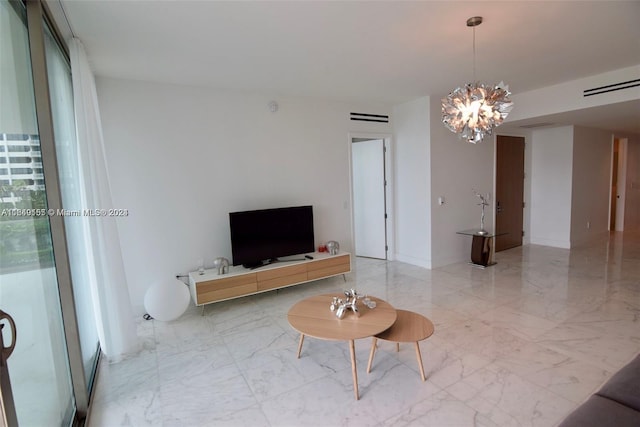 living room featuring a chandelier