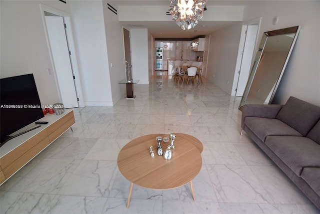 living room featuring a chandelier