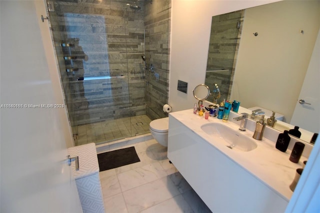 bathroom featuring vanity, toilet, and an enclosed shower