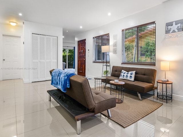 living room featuring light tile patterned flooring