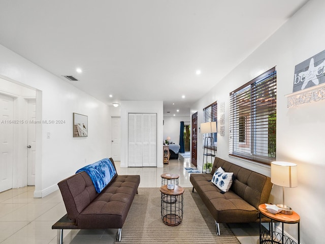 living room featuring light tile patterned flooring