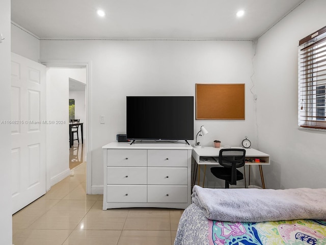 bedroom featuring light tile patterned floors