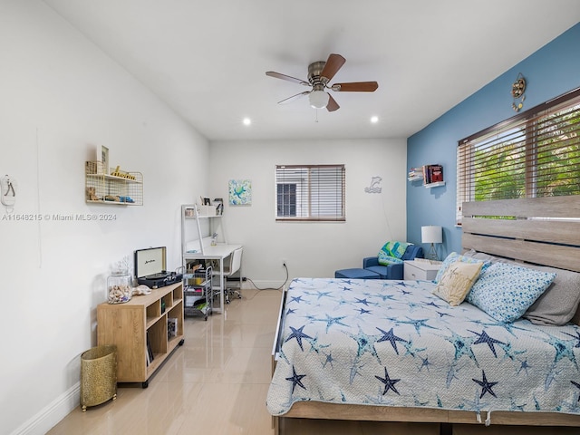 tiled bedroom with ceiling fan