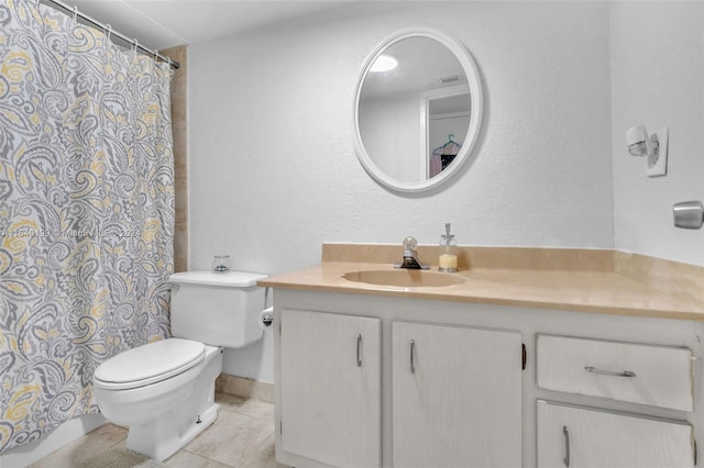 bathroom featuring tile patterned floors, a shower with curtain, toilet, and vanity