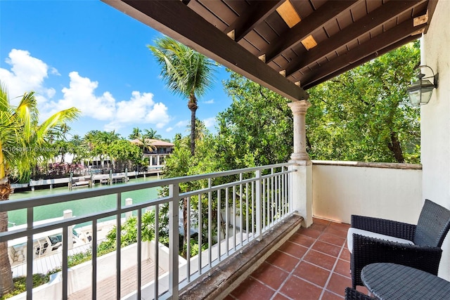 balcony featuring a water view