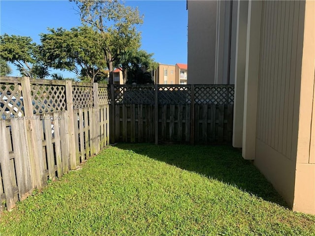 view of yard featuring a fenced backyard