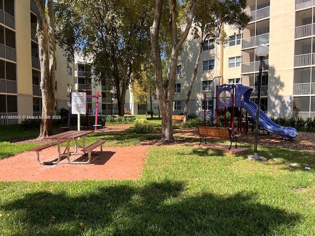 view of play area featuring a lawn