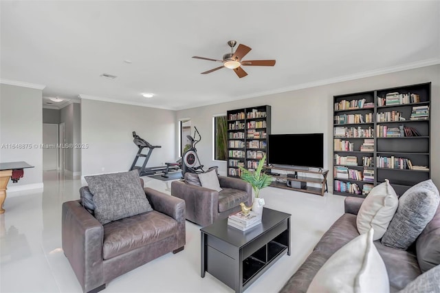 living room with ceiling fan and crown molding