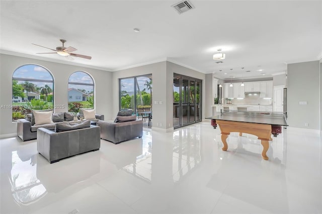 living room featuring ceiling fan, ornamental molding, billiards, and light tile patterned floors