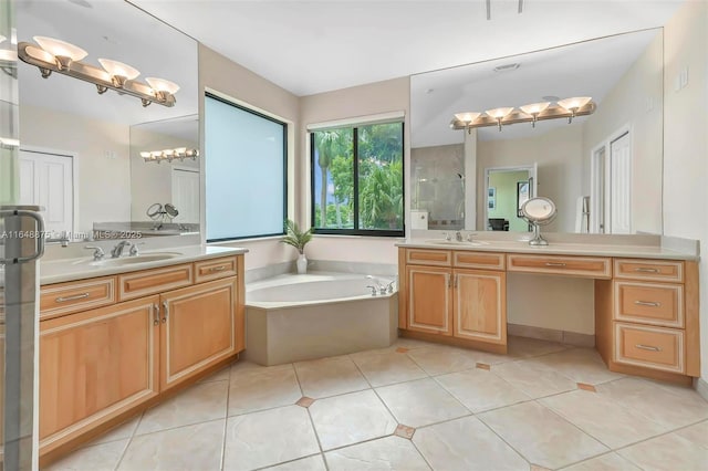 bathroom featuring tile patterned floors, vanity, and separate shower and tub