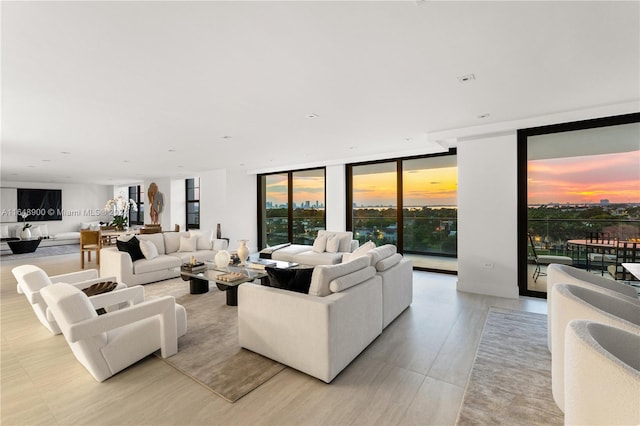 living room with floor to ceiling windows