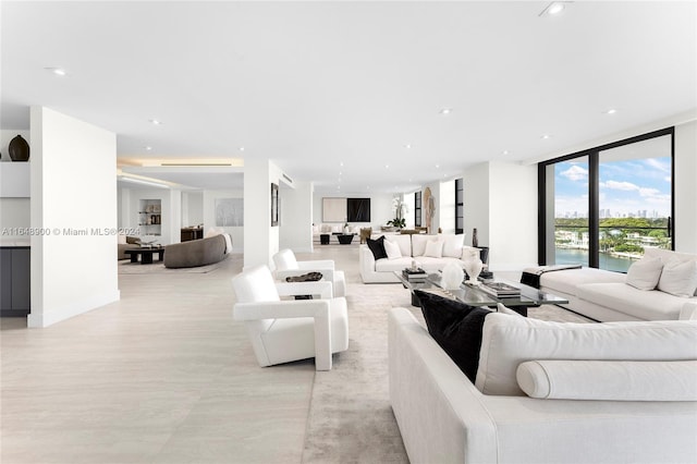 living room with floor to ceiling windows