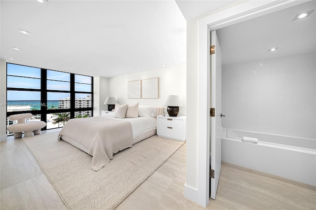 bedroom with light tile patterned floors