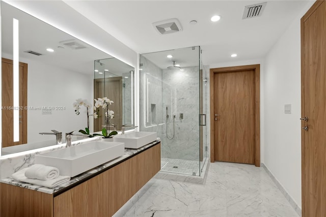 bathroom featuring vanity and walk in shower